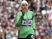 Saudi Arabia`s Sarah Attar competes in a women`s 800-meter heat during the athletics in the Olympic Stadium at the 2012 Summer Olympics, London.