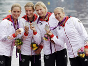 Germany`s, left to right, Carolin Leonhard, Franziska Weber, Katrin Wagner-Augus, and Tina Dietze pose after they won the silver medal for the women`s kayak four 500m in Eton Dorney, near Windsor, England, at the 2012 Summer Olympics.