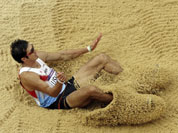 Japan`s Keisuke Ushiro competes in the men`s decathlon long jump during the athletics in the Olympic Stadium at the 2012 Summer Olympics in London