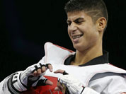 Sweden`s Uno Sanli reacts after his fight against Spain`s Joel Gonzalez Bonilla in men`s 58-kg taekwondo competition at the 2012 Summer Olympics.