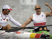 Norway`s Eirik Veras Larsen, right, celebrates after winning the gold medal in the men`s kayak single 1000m in Eton Dorney, near Windsor, England, at the 2012 Summer Olympics.