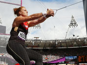 Germany`s Betty Heidler takes a throw in a women`s hammer throw qualification round during the athletics in the Olympic Stadium at the 2012 Summer Olympics.