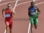 United States` Trey Hardee, Brazil`s Luiz Alberto De Araujo and United States` Ashton Eaton compete in a men`s decathlon 100-meter heat during the athletics in the Olympic Stadium at the 2012 Summer Olympics.