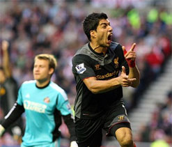 Suarez saves point for Liverpool in 1-1 draw at Sunderland
