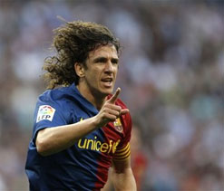 Carles Puyol signs Barcelona contract extension until 2016