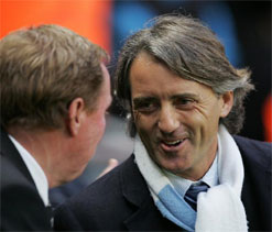 Redknapp says Mancini deserves medal for handling too many egos at Man City
