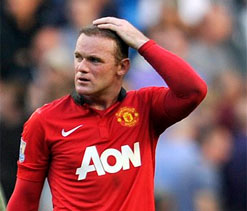 Rooney says `being made to play in midfield` caused rift with Ferguson