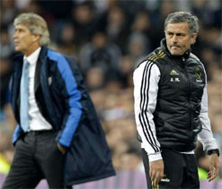 Ex-Real coaches Jose Mourinho and Manuel Pellegrini meet