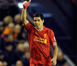 Proud Suarez commits to Liverpool