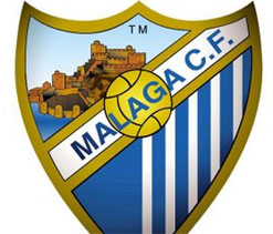 Malaga`s Champions League dreams alive despite loss