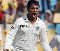 Ojha reaches 100-wicket milestone in Tests