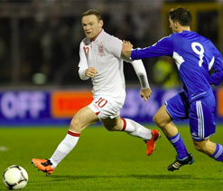 Rooney is England`s only `world-class` striker: Redknapp
