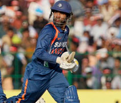 Karthik has earned his place in the side: Dhoni