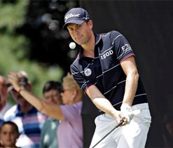 Simpson in charge at Firestone, Tiger lurks