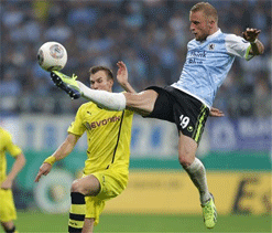 Dortmund advance, Mainz eliminated in German Cup