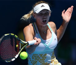 Shining Wozniacki puts Azarenka, Sharapova in shade at Australian Open 2014