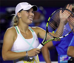 Australian Open 2014: Wozniacki overcomes McHale in surreal encounter