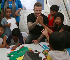 Beckham gives cheer in Philippines typhoon zone