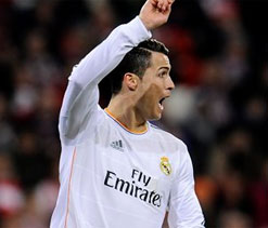 Ronaldo banned as three-way title chase hots up