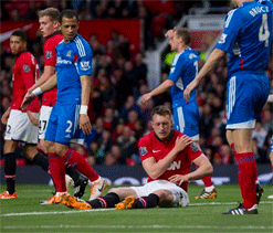 United`s Jones taken to hospital