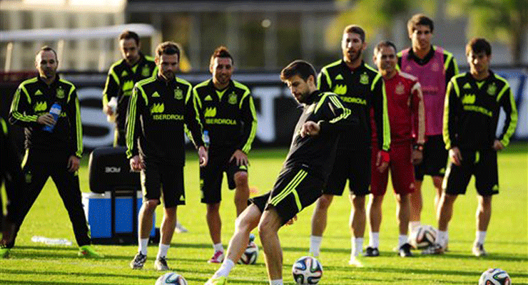 Bloodied Spain peer into abyss in Chile clash