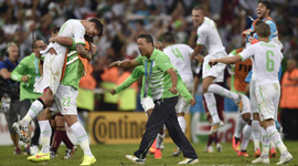 Slimani sends Algeria through at Russia`s expense