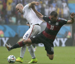 Podolski praises US fighting spirit