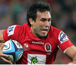 Reds score six tries to beat Rebels in basement battle