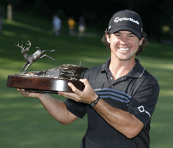 Harman wins first PGA title to reach British Open