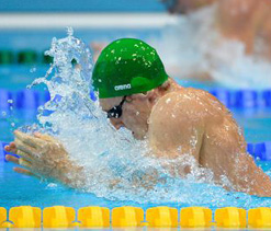 Emotional Van der Burgh retains 50m breaststroke gold